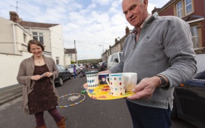 Neighbours sharing tea