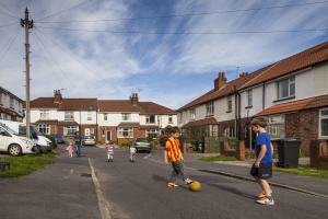Playing football in road