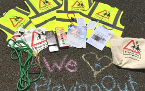 Contents of play street kit, including branded high viz waistcoats, chalks and skipping ropes