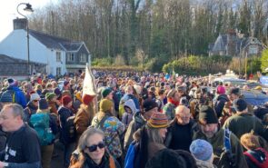 A large group of people gathered on Dartmoor to protest the removal of the right to wild camp